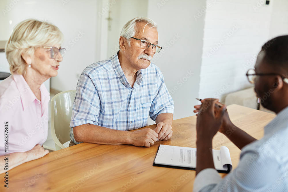 Obraz premium Happy senior old family couple clients make financial insurance estate business deal contract signing, agent lawyer, satisfied mature customers signing contract meeting bank manager agree on 
