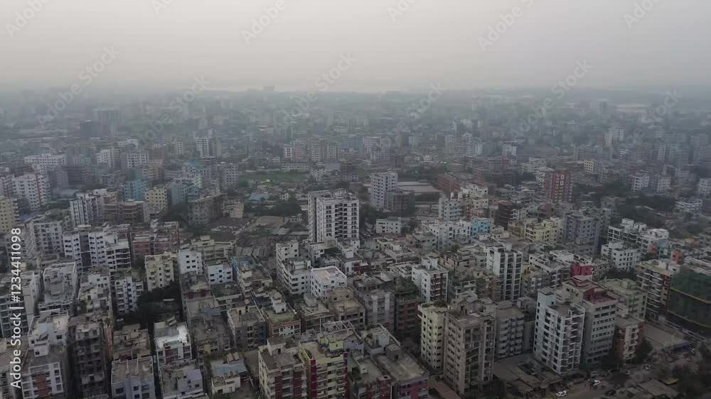 Cinematic Aerial of View Dhaka City. 4k, Drone flying above the Bangladesh city. Modern City high-rise skyscraper buildings in Dhaka City. Dhaka Life Building.