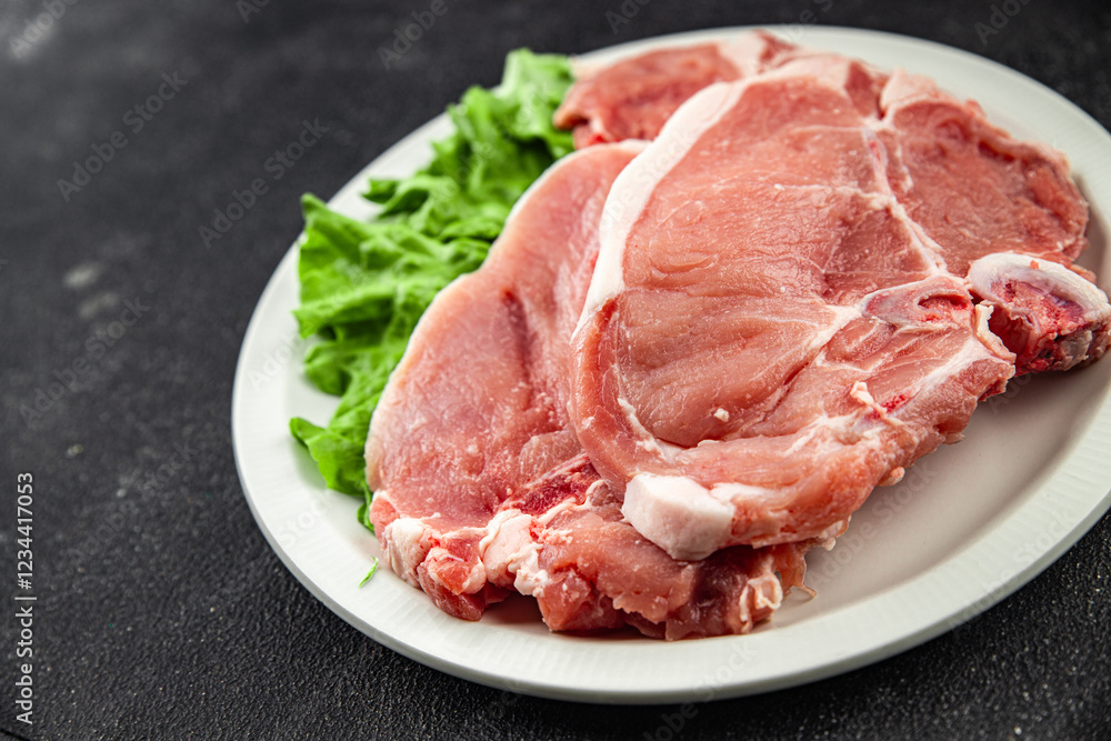 Pork on bones raw meat fresh tasty food dish delicious gourmet food background on the table rustic food top view copy space Pork on bones raw meat fresh tasty food dish delicious gourmet food background on the table rustic food top view copy space