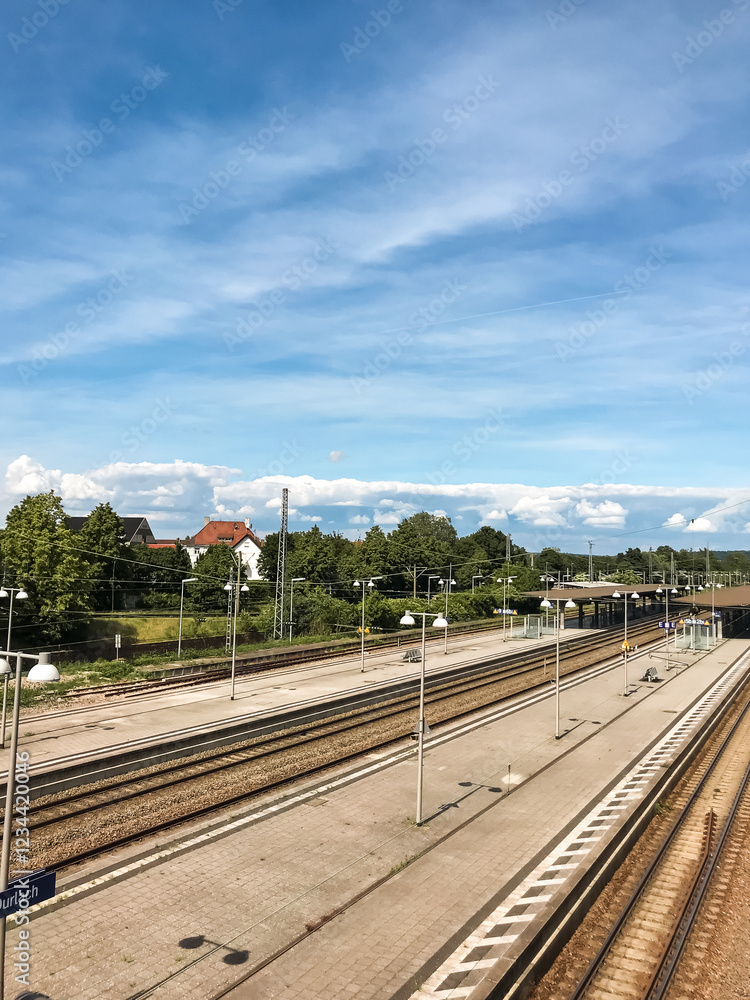 Fototapeta premium Train station with a clear blue sky above it