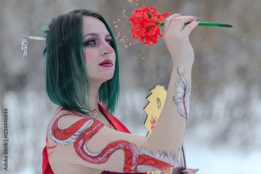 Fototapeta premium European girl with green hair in a red kimono in winter on the street