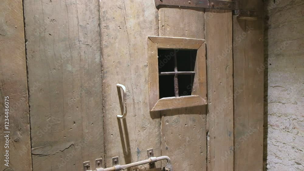 wooden dungeon door with small window wooden dungeon door with small window