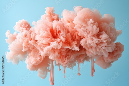 Vibrant Pink Cloud with Flowing Drips Against Light Blue Background photo