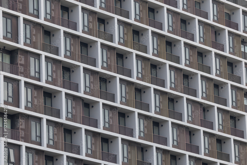 A building with many windows and a balcony A building with many windows and a balcony
