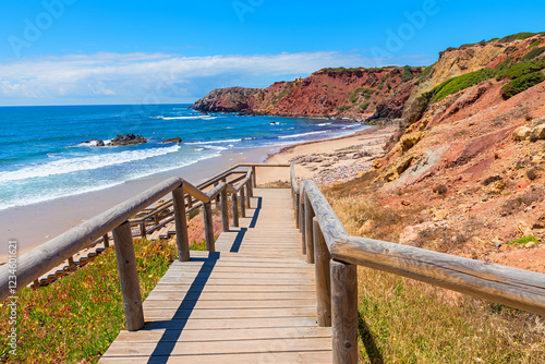boardwalk to Amado beach, West algarve, colorful Cliffs. landscape Portugal