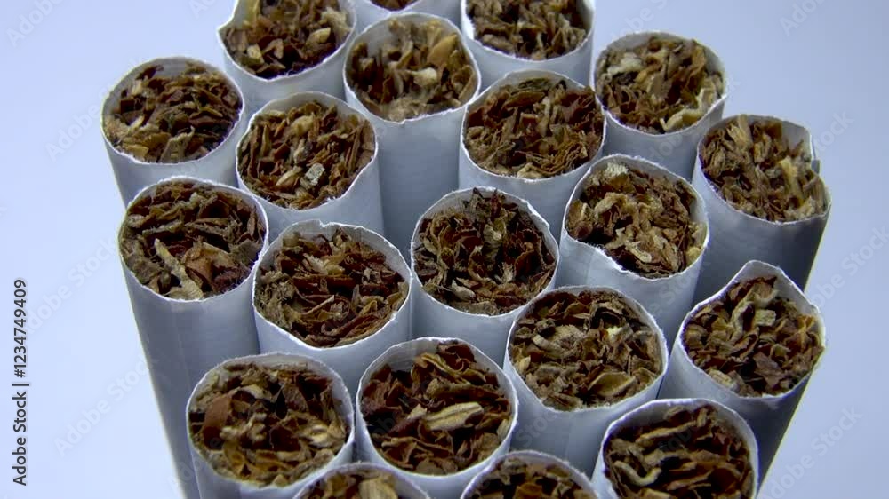 cigarettes with tobacco stacked on top of each other, close-up cigarettes with tobacco stacked on top of each other, close-up