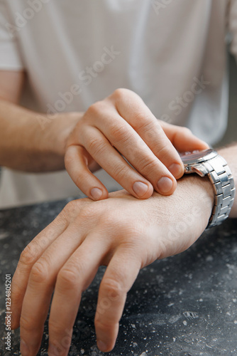 Trendy manicure caucasian man, demonstrating modern nail care