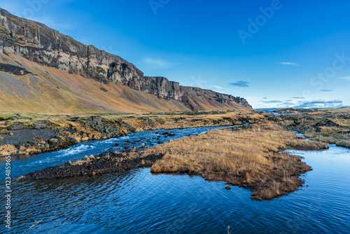 Obraz na płótnie The landscape around Orustuholl (Battle Hill) and the Fossalar River.in Iceland. w salonie