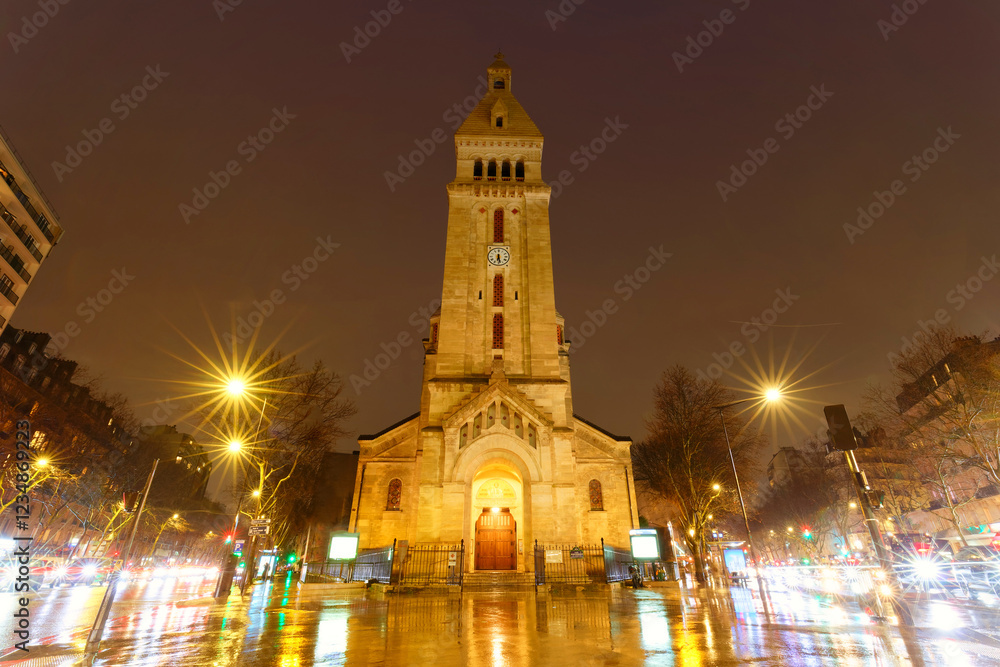 Obraz premium Saint-Pierre-de-Montrouge church at rainy night . It was built in the Ottoman era in the 14th district of Paris, France.
