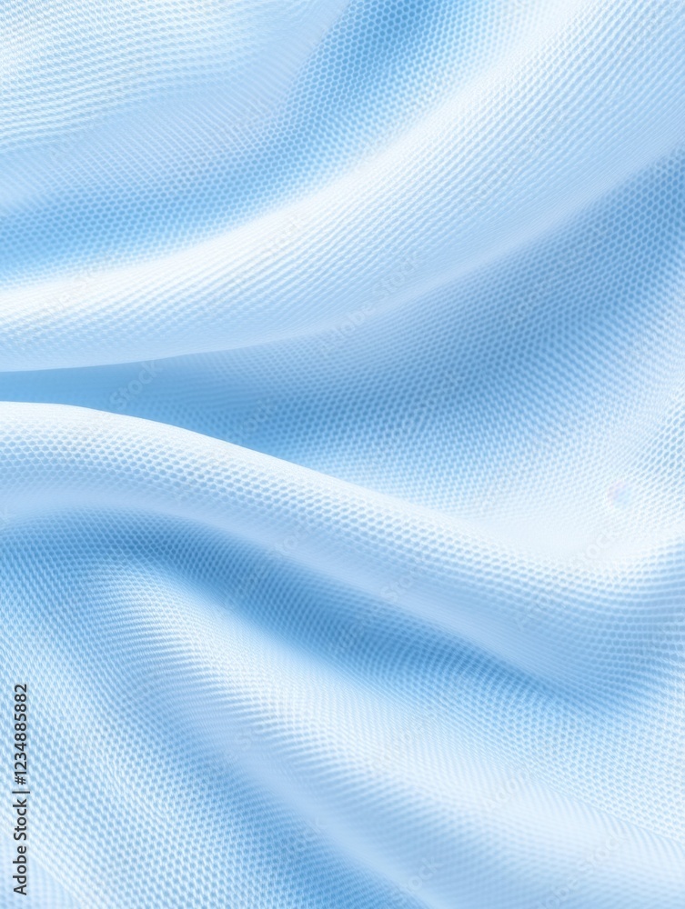Soft, light blue fabric with a textured weave, draped in gentle folds. Soft, light blue fabric with a textured weave, draped in gentle folds.