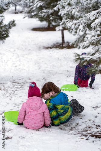 girls playing in the snow