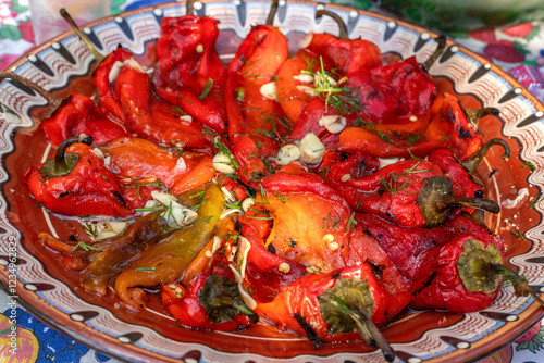 Obraz na płótnie plate of salad of roasted red peppers and garlic w salonie