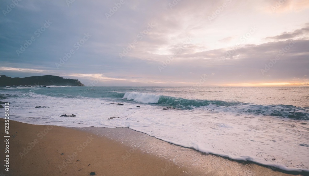 Empty Beach Captured at Sunset with Waves Crashing on Shore Empty Beach Captured at Sunset with Waves Crashing on Shore
