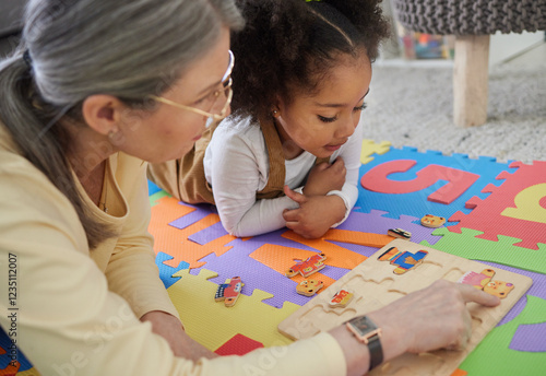 Konstfotografi Teacher, therapist and kid with toys for education, learning difficulty or early childhood development
