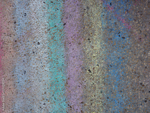 Stone fence painted with multi-colored chalk
