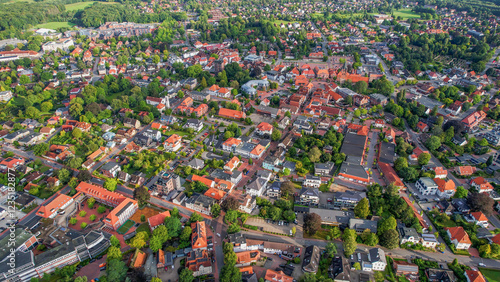 A wide aerial view around the old town of the city Westerstede on a sunny day in Germany
 photo