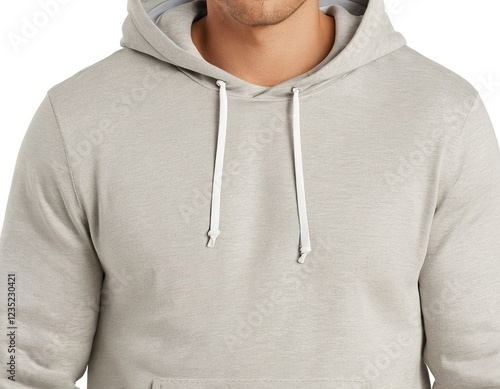 A close-up of a young man in a light gray hoodie, showcasing a casual and relaxed style.