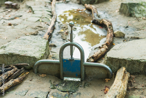 Wallpaper Mural Water channel with metal sluice gate on the playground Torontodigital.ca