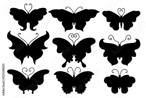 Collection of silhouettes of winged insects butterflies. Vector graphics.