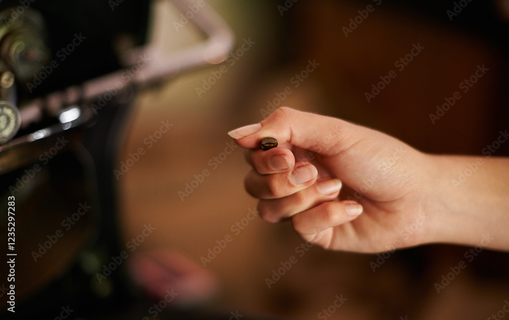 Hand, coffee bean and machine with person in cafe for artisan roaster, caffeine supplier or organic product. Espresso, cold brew or aroma with barista in restaurant for small business and drink order