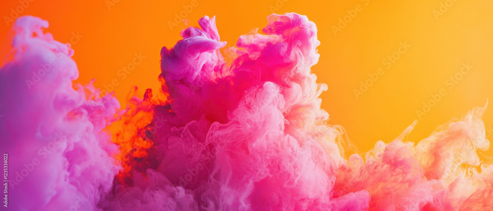 Obraz premium Vibrant pink and orange color cloud explosion in soft light