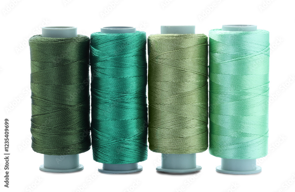 Spools of colorful sewing threads isolated on white Spools of colorful sewing threads isolated on white
