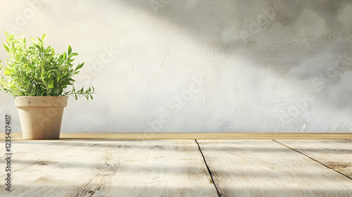 Potted plant on wooden table with soft light illuminating a textured wall