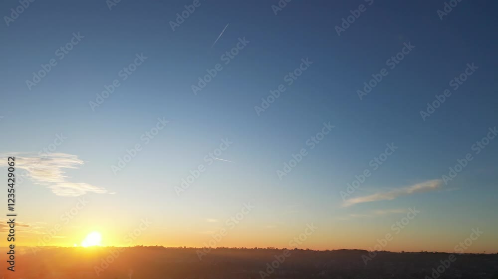 Gorgeous Winter Unique Dramatic Clouds and Sky over City of England Great Britain. Aerial Footage Was Captured with drone's Camera from High Altitude During Sunrise Morning Gorgeous Winter Unique Dramatic Clouds and Sky over City of England Great Britain. Aerial Footage Was Captured with drone's Camera from High Altitude During Sunrise Morning