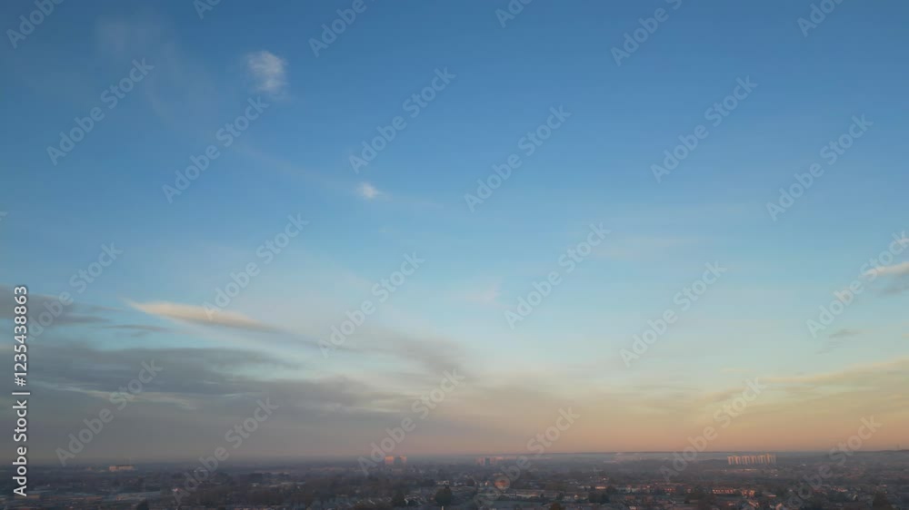 Gorgeous Winter Unique Dramatic Clouds and Sky over City of England Great Britain. Aerial Footage Was Captured with drone's Camera from High Altitude During Sunrise Morning Gorgeous Winter Unique Dramatic Clouds and Sky over City of England Great Britain. Aerial Footage Was Captured with drone's Camera from High Altitude During Sunrise Morning