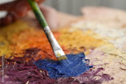 Wallpaper Mural Painting with palette and paintbrush, closeup view Torontodigital.ca