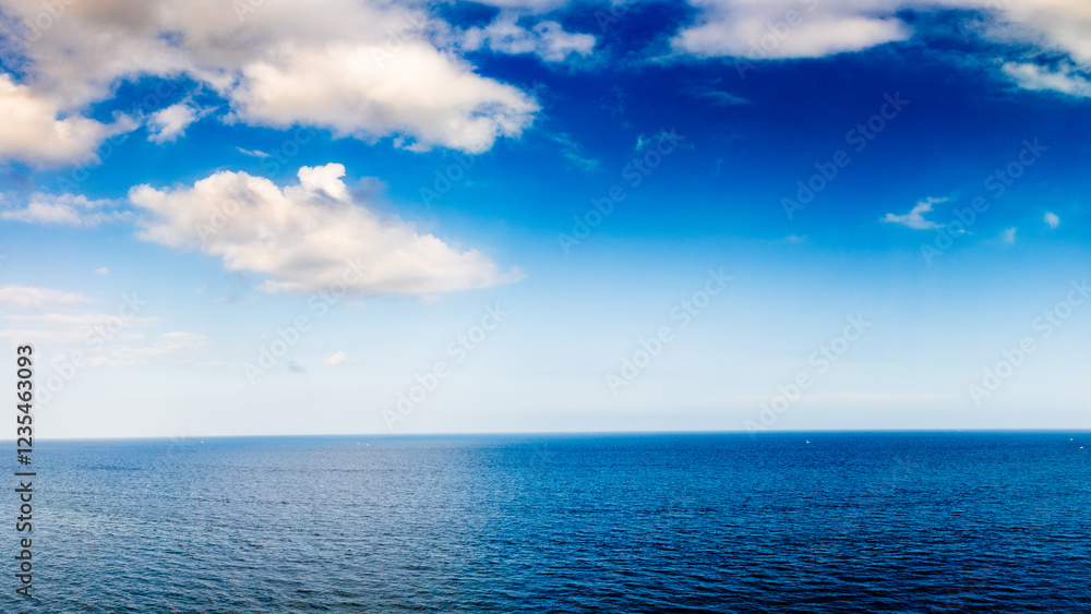 panoramic drone view of clouds in blue sky over ocean panoramic drone view of clouds in blue sky over ocean