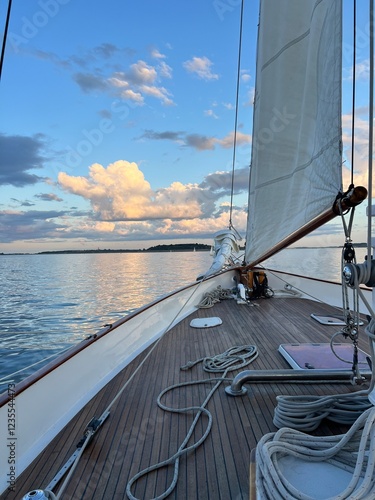 Valokuva Sailing across the calm waters of the Boston Harbor on a summer sunset night