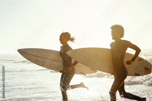 Canvas Print Man, woman and surfing with running at beach for fitness, waves and training together in summer sunshine