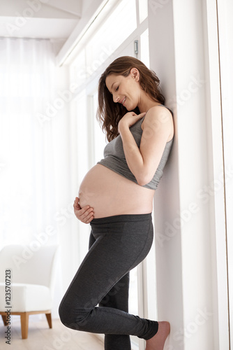 Free Download Happy woman, bonding or pregnancy in home with peace, growth or baby bump for development. Pregnant, touch stomach or IVF healthcare with maternity wellness to relax for security, belly or motherhood - GFXLoad