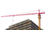 Under construction high multi-storey building with tower type construction crane isolated on transparent white background. Blank for industry, real estate investment at stage of construction of walls