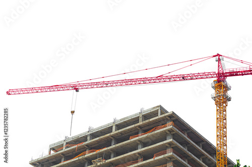 Under construction high multi-storey building with tower type construction crane isolated on transparent white background. Blank for industry, real estate investment at stage of construction of walls
