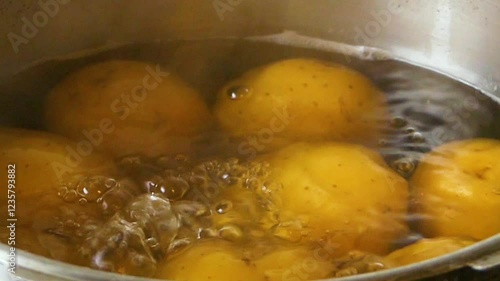Boiling Potatoes In the Process of Preparing a Comforting Dish
