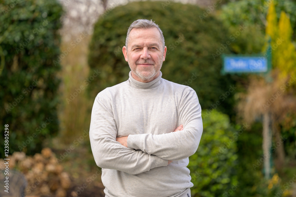 Confident Man Standing in Garden Confident Man Standing in Garden