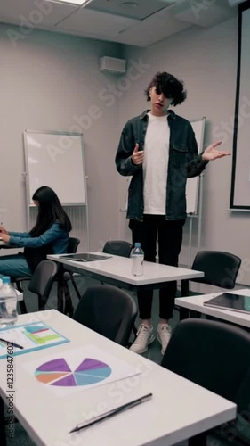 Wallpaper Mural Engaging Classroom Interaction During a Presentation by a Presenter with Students Focused on Learning and Note-Taking in a Modern Academic Environment Torontodigital.ca