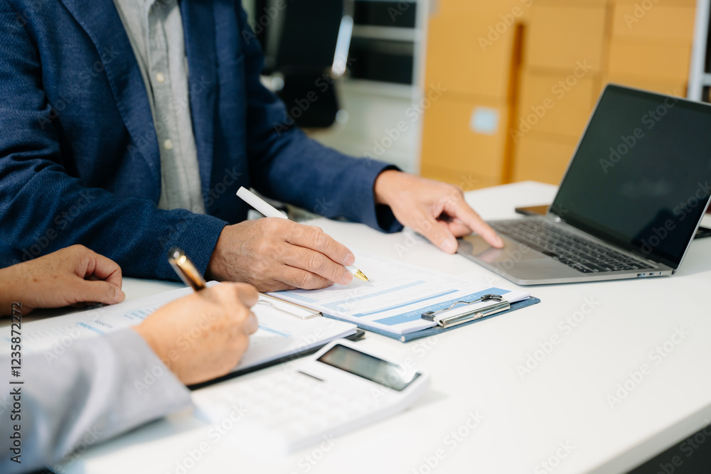 © Nuttapong punna - Business team meeting present.professional investor working with Finance managers task © Nuttapong punna - Business team meeting present.professional investor working with Finance managers task