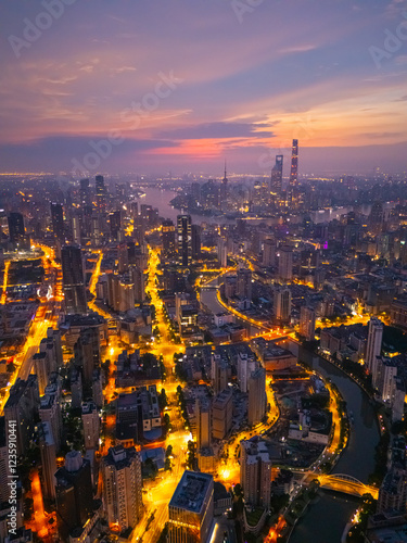 Wallpaper Mural Aerial view of Shanghai skyline and bright city streets at dawn Torontodigital.ca