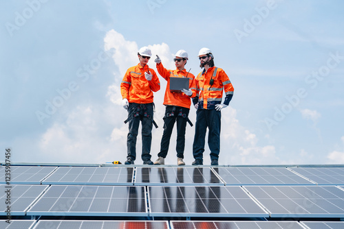 Technician team checks the maintenance of the solar panels on the roof, Sustainable energy industry concept, Renewable energy solution for climate change..