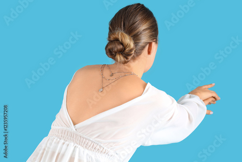 Beautiful young woman in wh...