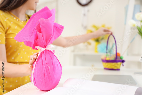 Young woman with Easter gif...
