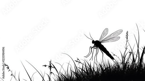 Silhouette of dragonfly in grass photo