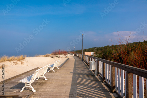 beautiful promenade with benches on the Baltic Sea coast, Dziwnow, Poland photo