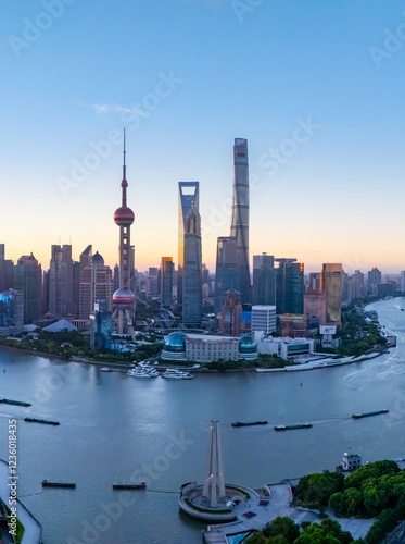 Aerial view of shanghai skyline and winding river at sunrise