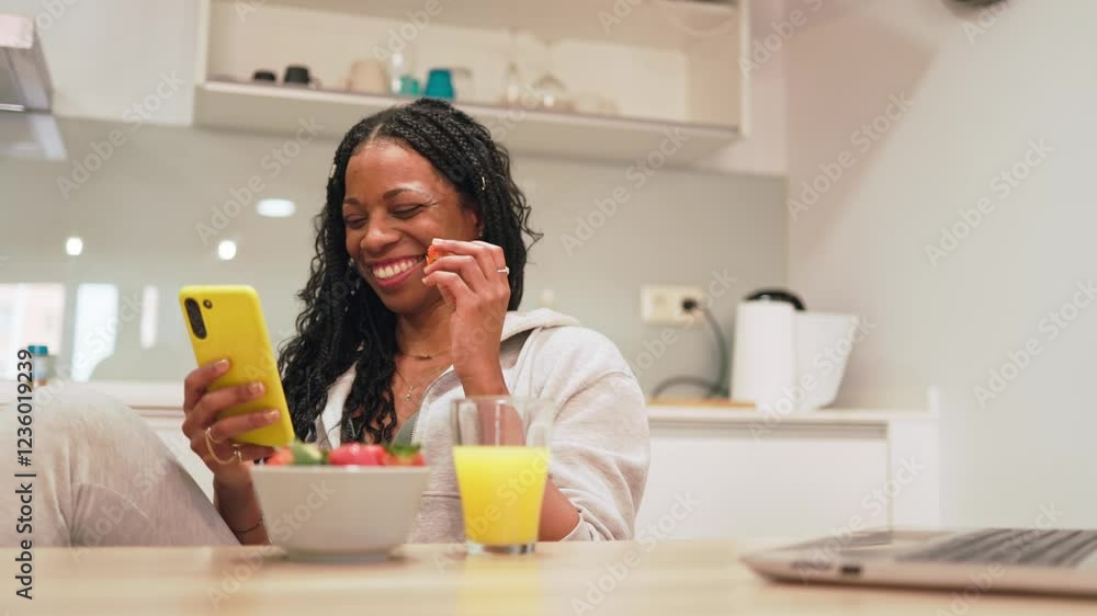 Happy black woman enjoying breakfast and social media Happy black woman enjoying breakfast and social media