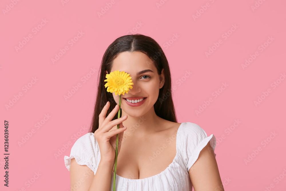 Beautiful young happy woman with chrysanthemum flower on pink background Beautiful young happy woman with chrysanthemum flower on pink background