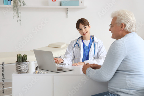 Female doctor working with ...